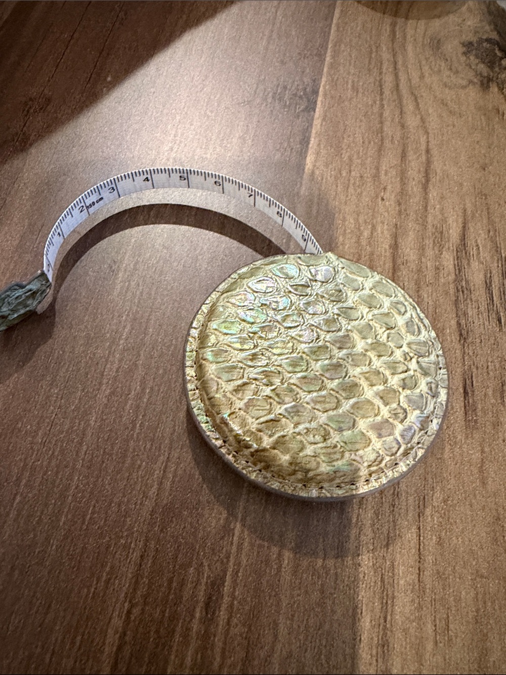 Brahmin Gold Snakeskin Round Tape Measure